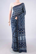 Navy Blue Chanderi Cotton Saree with Batik Print on the body and Thin Zari Line.  displayed on a mannequin