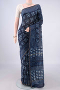 Indigo Chanderi Cotton Saree with Batik Print on the body and Thin Zari Line.  displayed on a mannequin