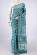 Maya Blue Chanderi Cotton Saree with Batik Print on the body and Thin Zari Line.  displayed on a mannequin