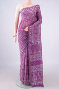 Purple Chanderi Cotton Saree with Batik Print on the body and Thin Zari Line.  displayed on a mannequin