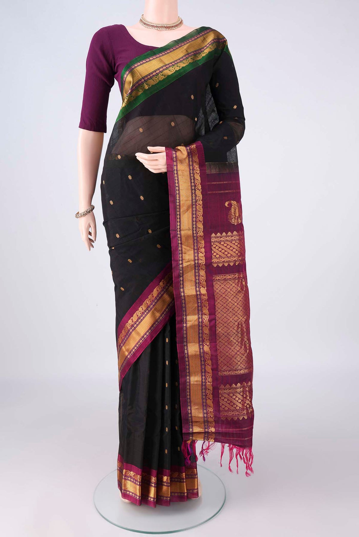 Black Gadwal Cotton Saree with Thread Butta on the body and Zari Border.  displayed on a mannequin