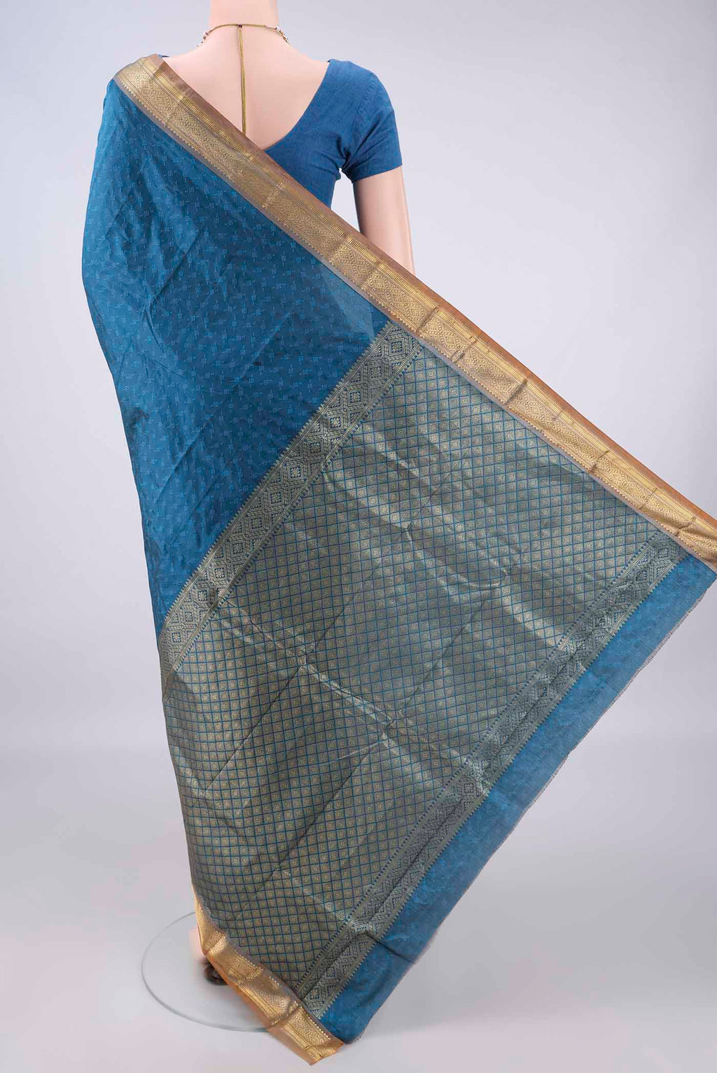 Flat view of Blue Blended Bangalore Silk Saree with Jacquard design on the body and Zari Border. 