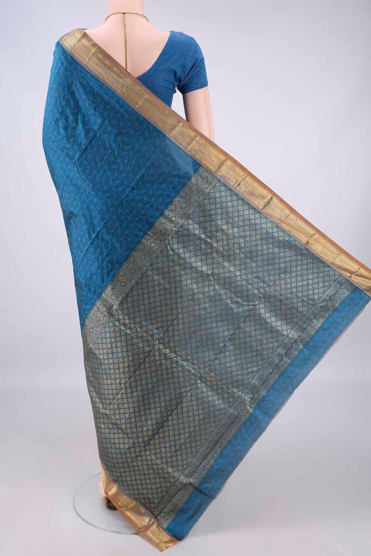 Flat view of Blue Blended Bangalore Silk Saree with Jacquard design on the body and Zari Border. 