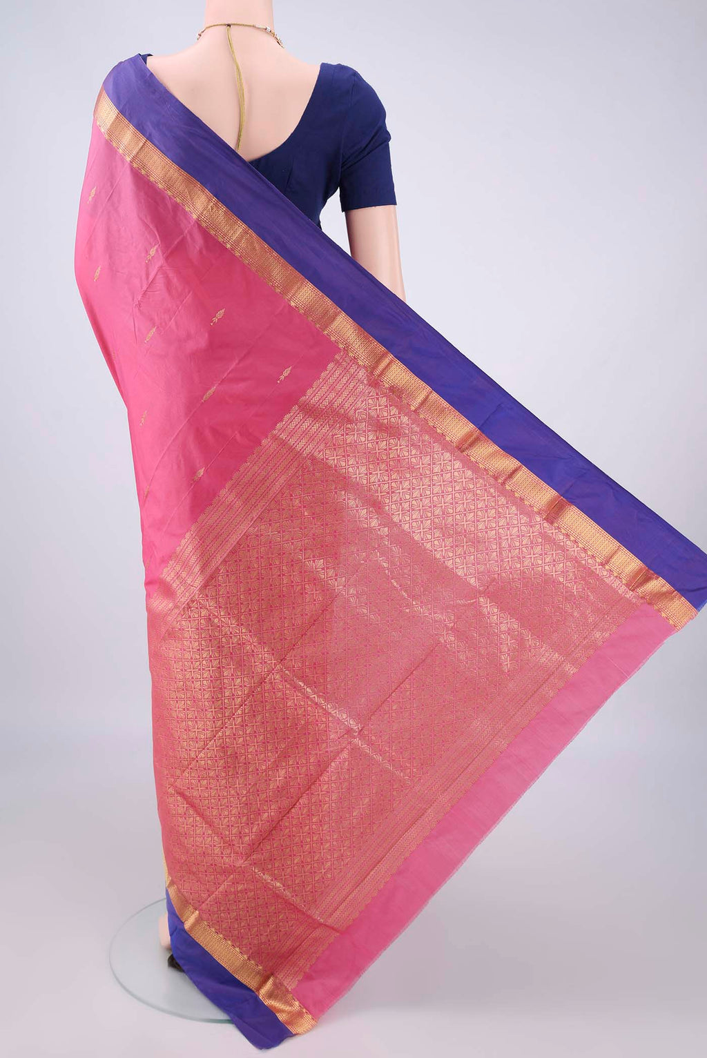 Flat view of Rose pink Blended Bangalore Silk Saree with Zari Butta on the body and Zari Border. 