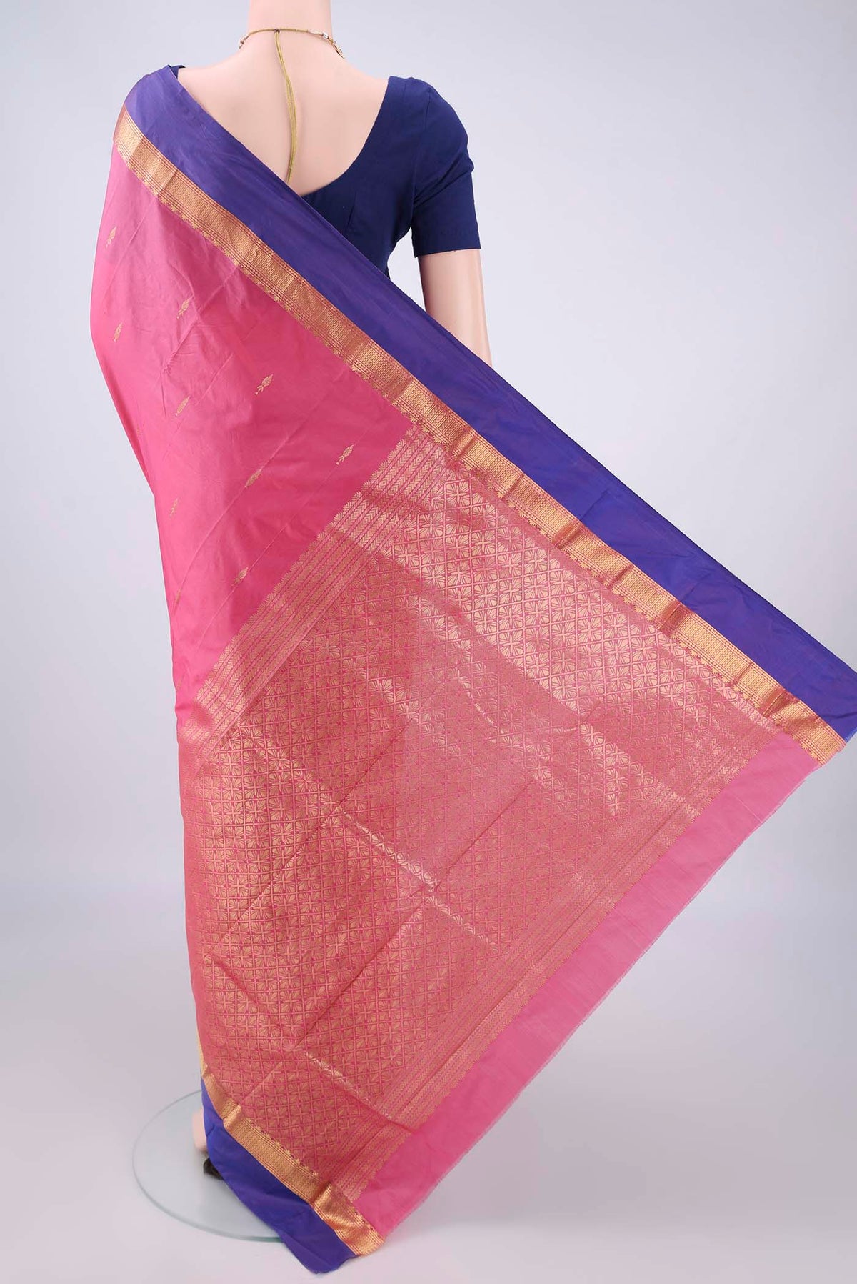 Flat view of Rose pink Blended Bangalore Silk Saree with Zari Butta on the body and Zari Border. 