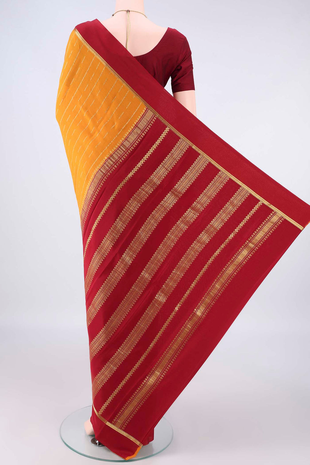Flat view of Mustard Mysore Crepe Saree with Stripes on the body and Plain Border. 