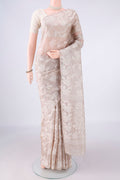 Beige Tussar Saree with Jamdani on the body and Thread Border.  displayed on a mannequin