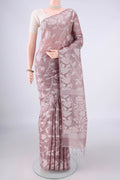 Rose Gold Tussar Saree with Jamdani on the body and Thread Border.  displayed on a mannequin