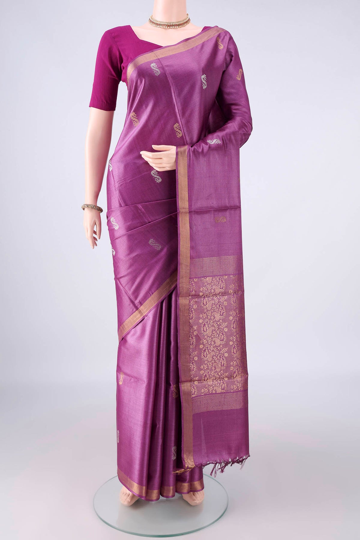 Purple MP Tussar Saree with Zari Butta on the body and Zari Border.  displayed on a mannequin