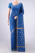 Blue Tussar Saree with Zari Butta on the body and Zari Border.  displayed on a mannequin