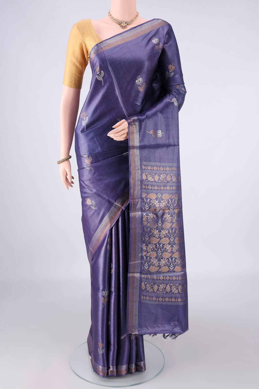 Blue Grey MP Tussar Saree with Zari Butta on the body and Zari Border.  displayed on a mannequin