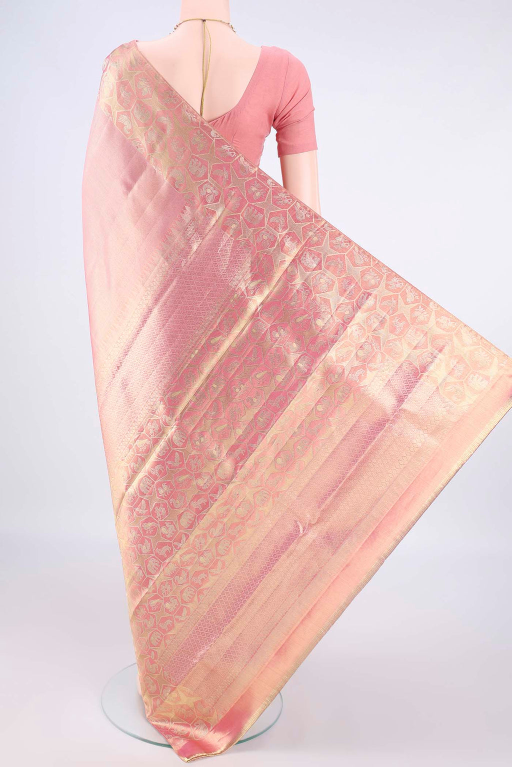 Flat view of Golden Peach Dual Tone Kanjivaram Tissue Saree with Zari Brocade on the body and Zari Border. 