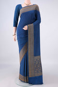 Royal Blue Banarasi Georgette Saree with Zari Butta on the body and Zari Border.  displayed on a mannequin