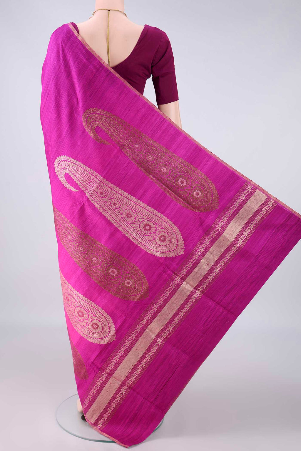 Flat view of Magenta Banarasi Tussar Saree with Ombre design on the body and Zari Border. 