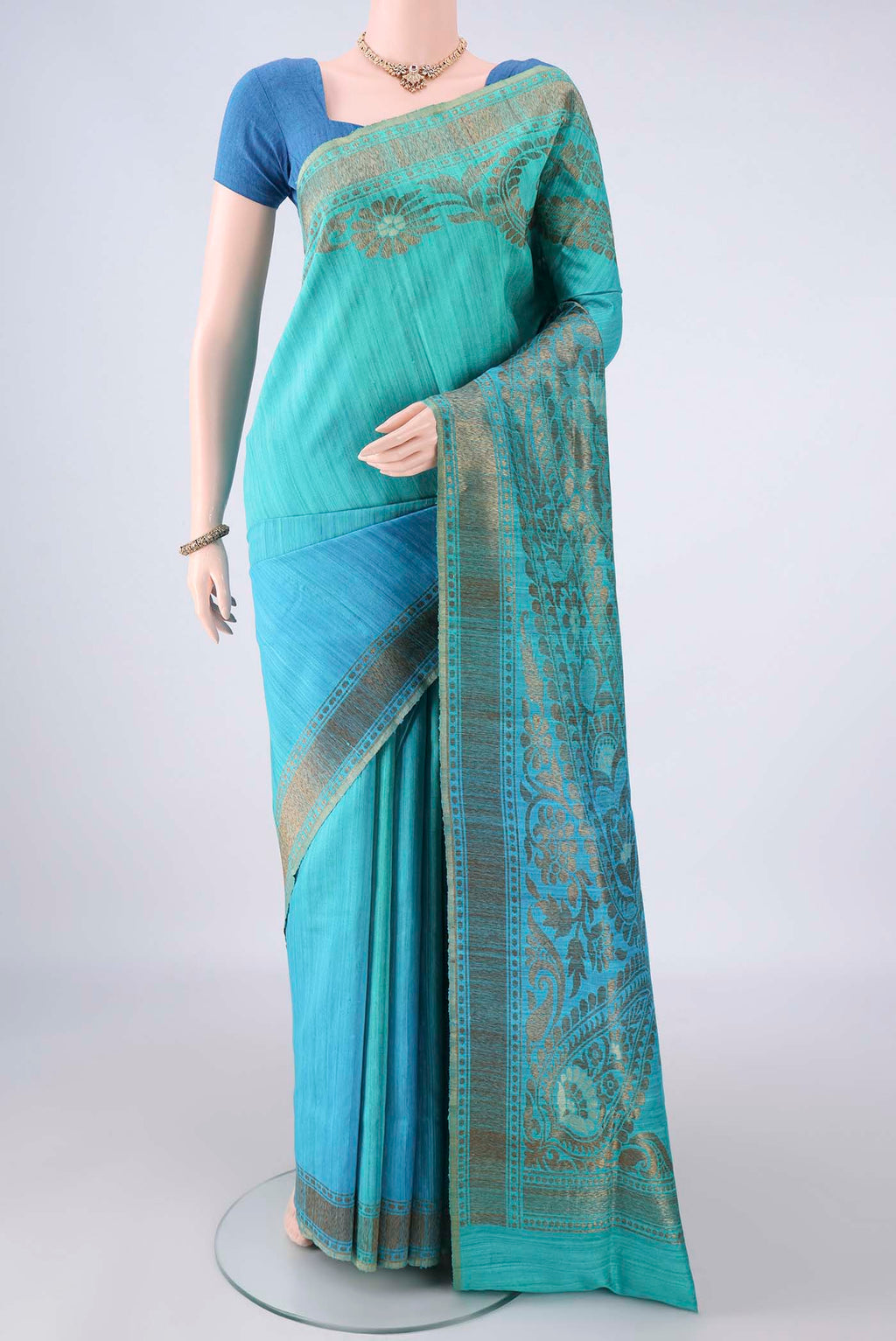 Multi Color Banarasi Tussar Saree with Ombre design on the body and Zari Border.  displayed on a mannequin