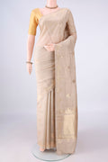 Pure Silk Beige Banarasi Katan Saree with Zari And Thread Butta on the body and Zari Border.  displayed on a mannequin