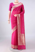 Pure Silk Pink Banarasi Katan Saree with Zari And Thread Butta on the body and Zari Border.  displayed on a mannequin