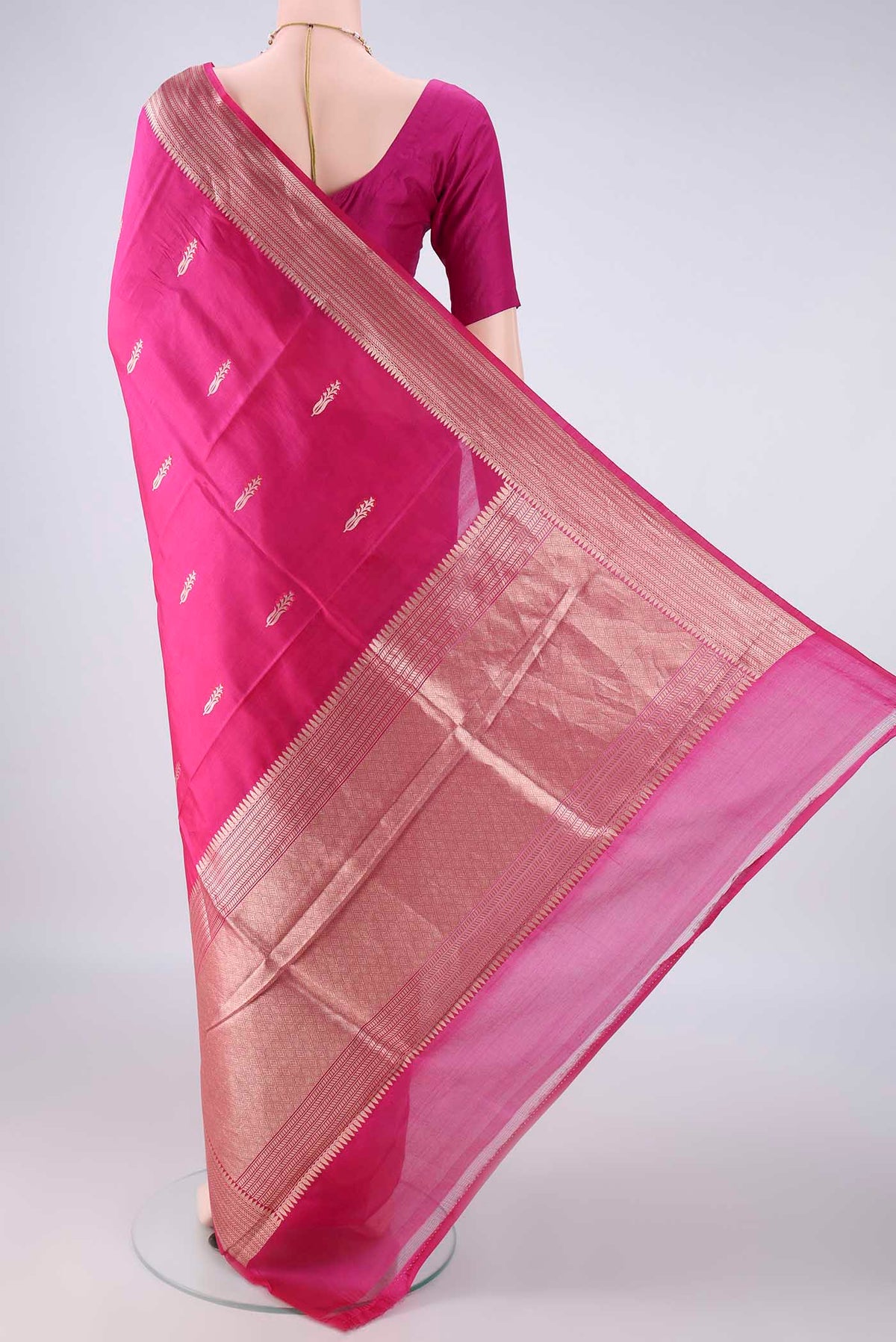 Flat view of Pure Silk Pink Banarasi Katan Saree with Zari And Thread Butta on the body and Zari Border. 