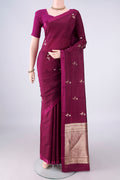 Pure Silk Burgundy Banarasi Katan Saree with Zari And Thread Butta on the body and Without Border.  displayed on a mannequin