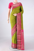 Green Blended Bangalore Silk Saree with Zari Butta on the body and Zari Border.  displayed on a mannequin