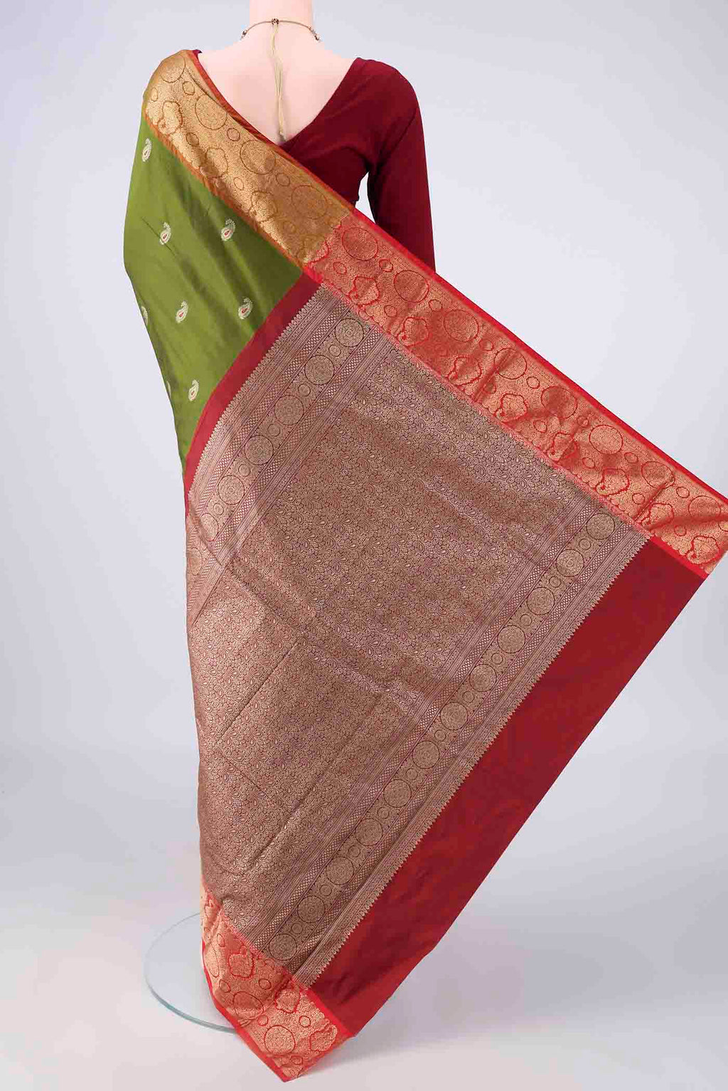 Flat view of Mehandi Green Blended Bangalore Silk Saree with Zari Butta on the body and Zari Border. 