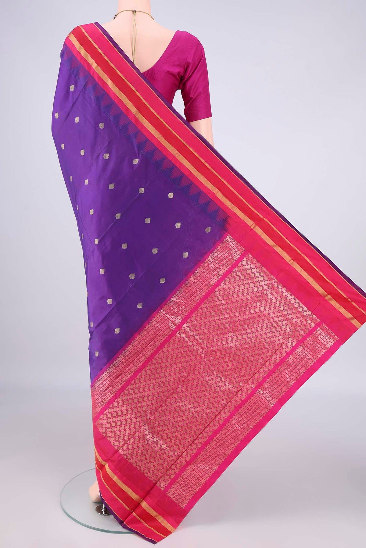 Flat view of Purple Blended Bangalore Silk Saree with Zari Butta on the body and Temple Border. 