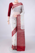 Pure Silk White Banarasi Raw Saree with Zari Butta on the body and Zari Border.  displayed on a mannequin
