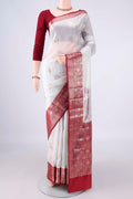 Pure Silk White Banarasi Raw Saree with Zari Butta on the body and Zari Border.  displayed on a mannequin
