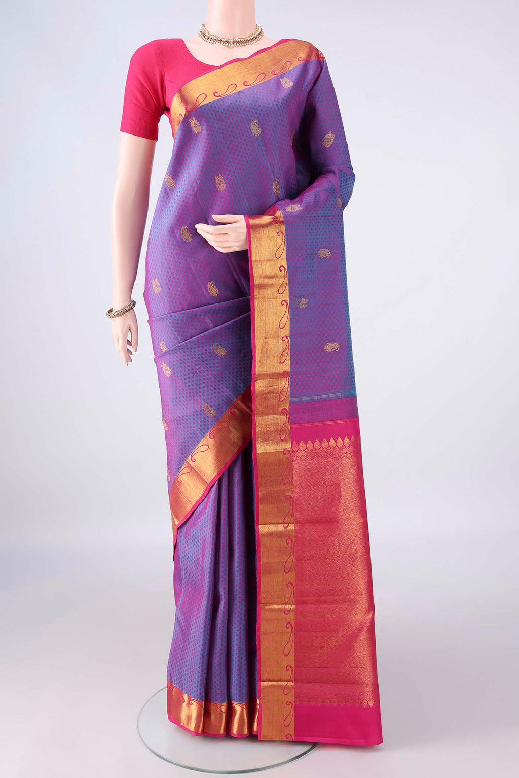 Pure Silk Lavender Kanjivaram Saree with Jacquard With Zari Butta on the body and Zari Border.  displayed on a mannequin