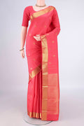 Pure Silk Coral Kanjivaram Saree with Jacquard With Zari Butta on the body and Zari Border.  displayed on a mannequin