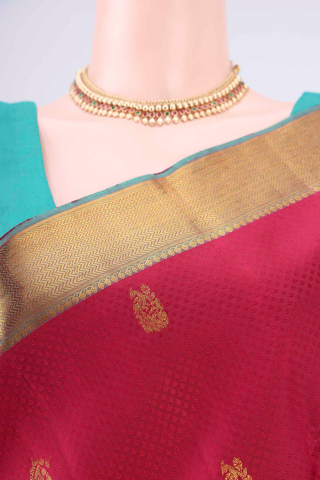 Border image of Pure Silk Deep Red Kanjivaram Saree with Jacquard With Zari Butta on the body and Zari Border. 