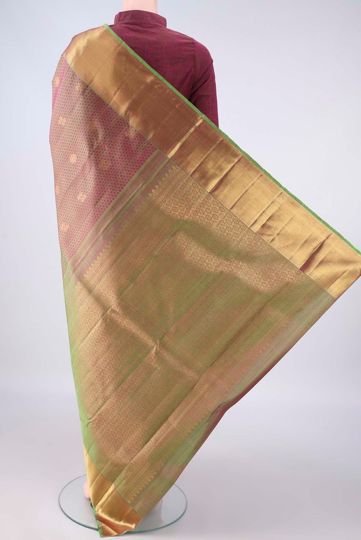 Flat view of Pure Silk Green with Pink Color Kanjivaram Saree with Jacquard With Zari Butta on the body and Zari Border. 
