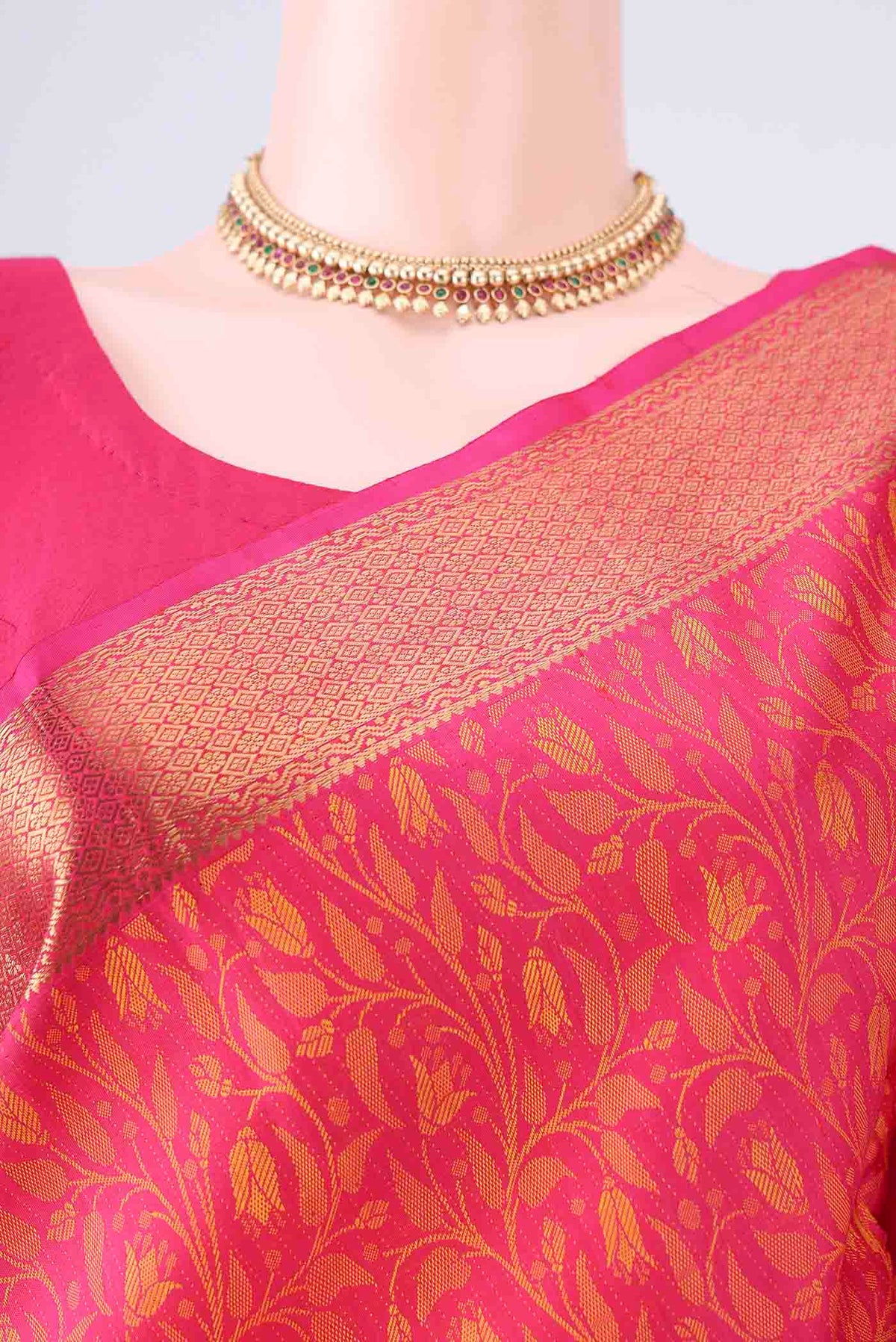Border image of Pure Silk Rani Pink Kanjivaram Saree with Jacquard design on the body and Zari Border. 