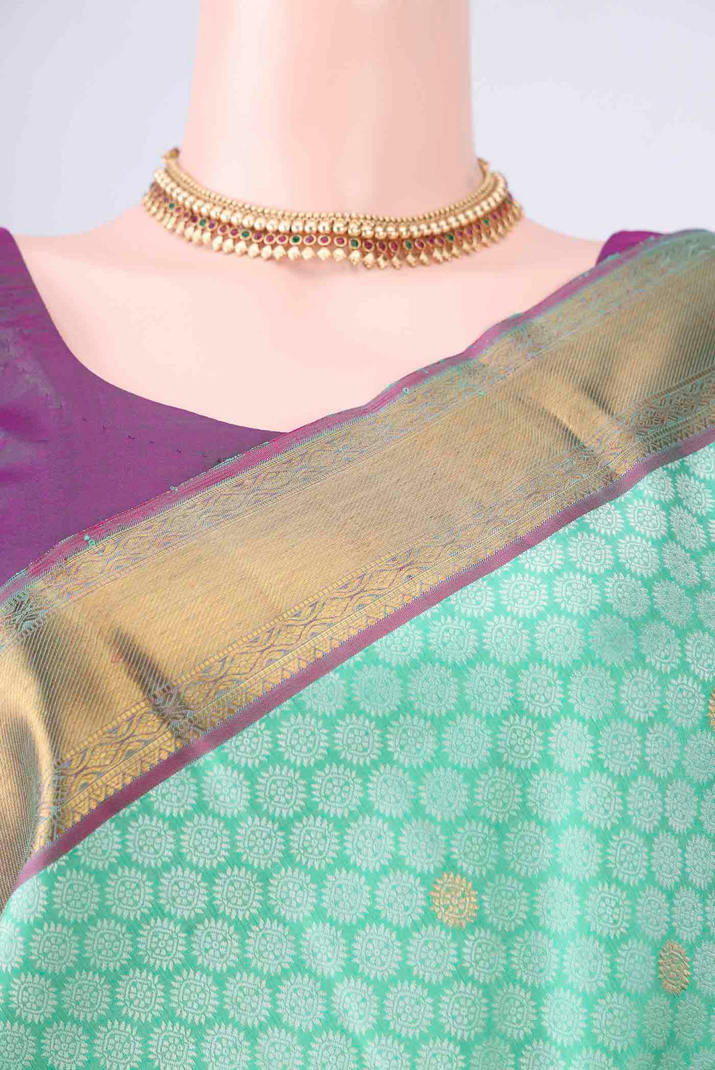 Border image of Pure Silk Mint Green Kanjivaram Saree with Jacquard With Zari Butta on the body and Zari Border. 