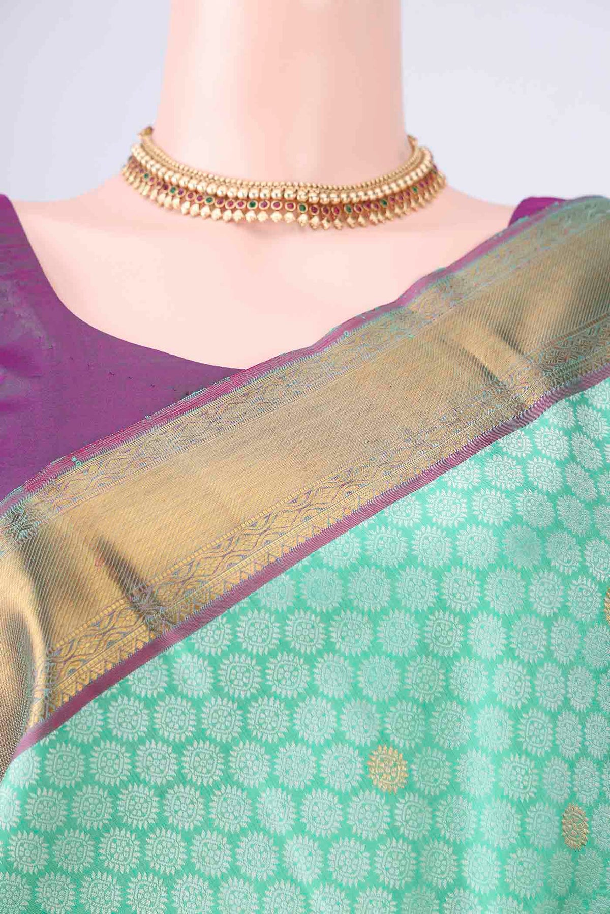 Border image of Pure Silk Mint Green Kanjivaram Saree with Jacquard With Zari Butta on the body and Zari Border. 