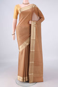 Caramel Mysore Crepe Saree with Plain Body and Zari Border.  displayed on a mannequin
