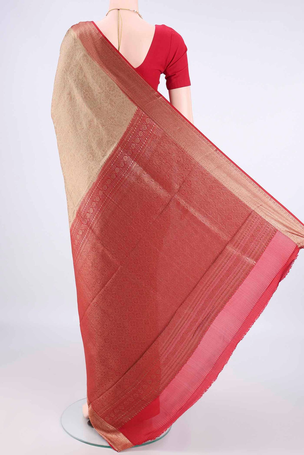 Flat view of Dark Beige Mysore Crepe Saree with Zari Brocade on the body and Zari Border. 