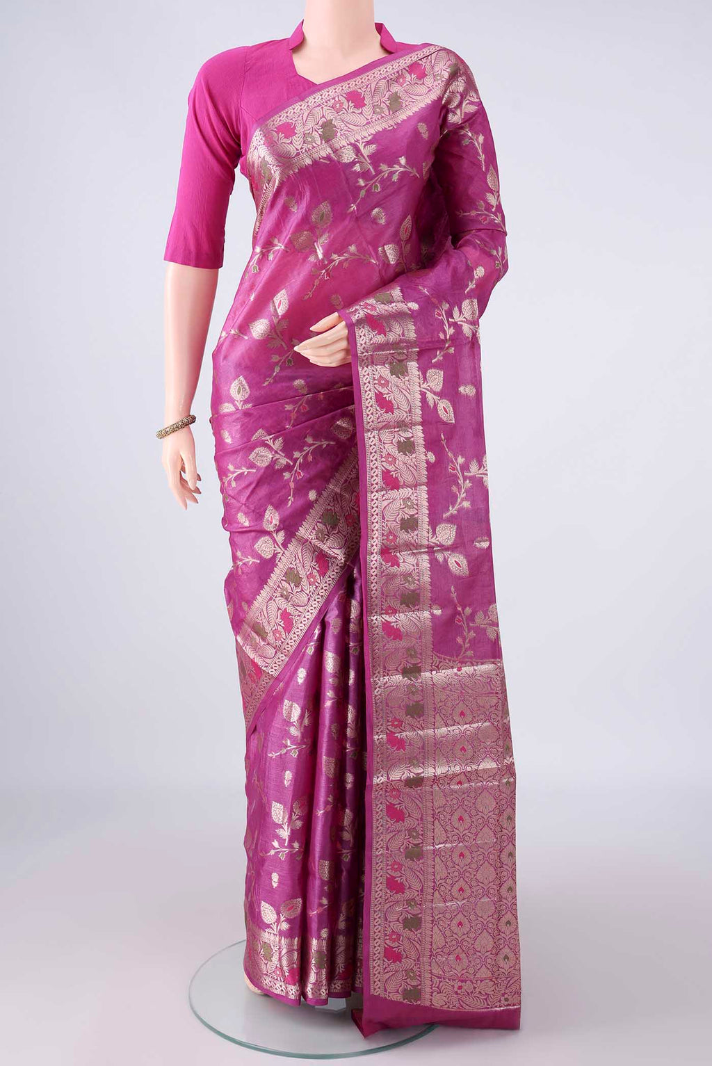 Pink Banarasi Tussar Saree with Zari And Thread Butta on the body and Zari And Thread Border.  displayed on a mannequin