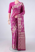 Pink Banarasi Tussar Saree with Zari And Thread Butta on the body and Zari And Thread Border.  displayed on a mannequin