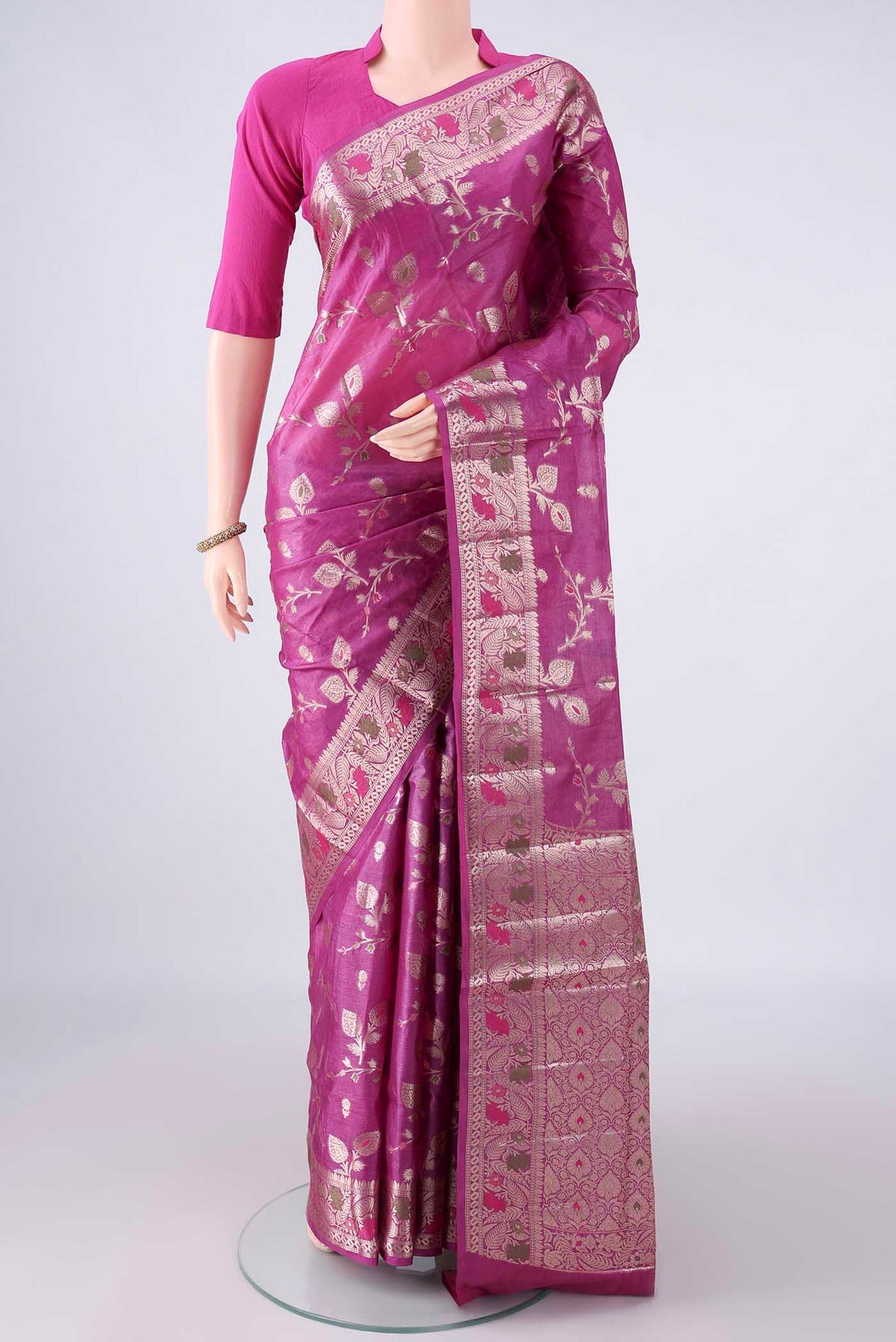 Pink Banarasi Tussar Saree with Zari And Thread Butta on the body and Zari And Thread Border.  displayed on a mannequin