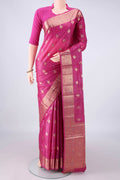 Pink Banarasi Tussar Saree with Zari And Thread Butta on the body and Zari And Thread Border.  displayed on a mannequin