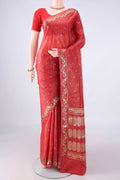 Brick Orange Banarasi Tussar Saree with Zari Butta on the body and Zari And Thread Border.  displayed on a mannequin
