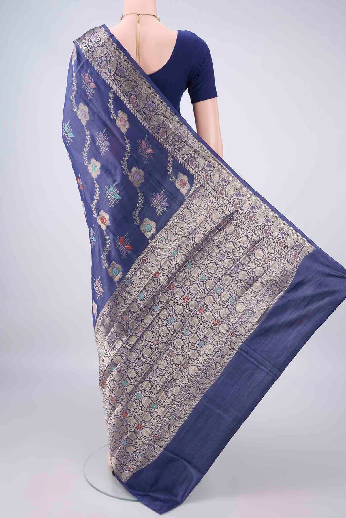 Flat view of Royal Blue Banarasi Tussar Saree with Zari Brocade on the body and Zari And Thread Border. 