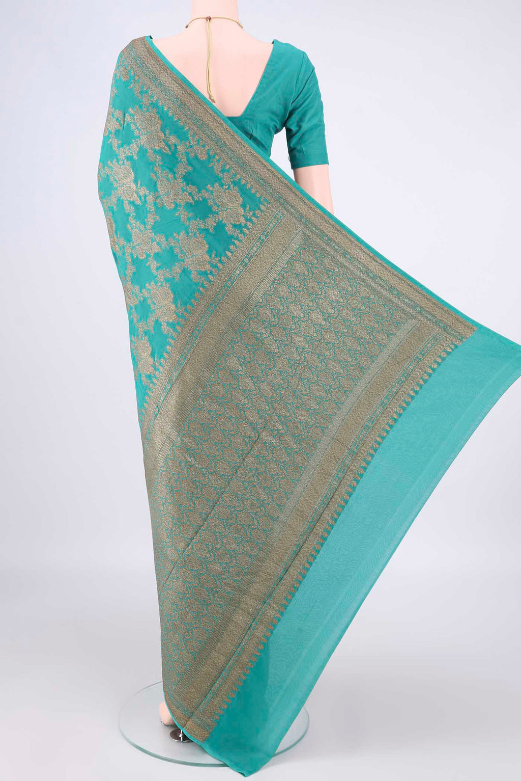 Flat view of Pure Silk Sea Green Paithani Saree with Zari Brocade on the body and Zari Border. 