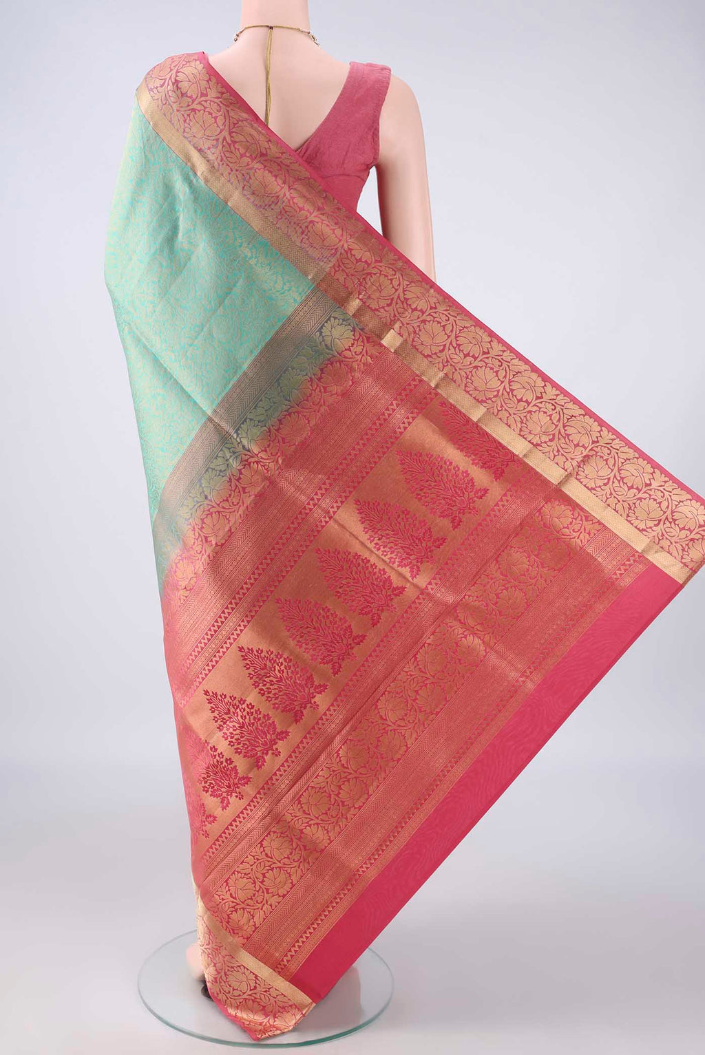 Flat view of Pure Silk Turquoise Soft Saree with Zari Brocade on the body and Zari Border. 