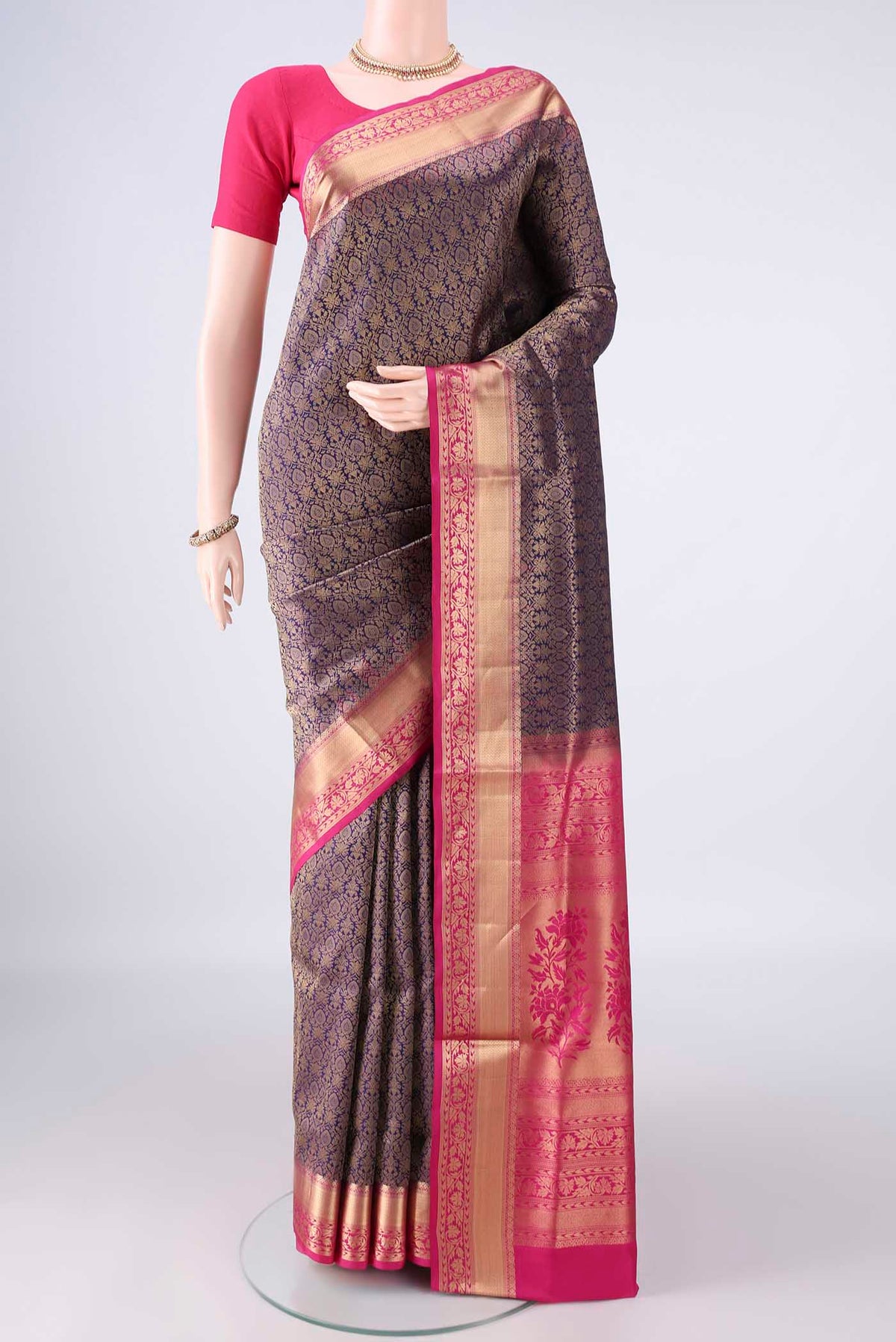 Pure Silk Navy Blue Soft Saree with Zari Brocade on the body and Zari Border.  displayed on a mannequin
