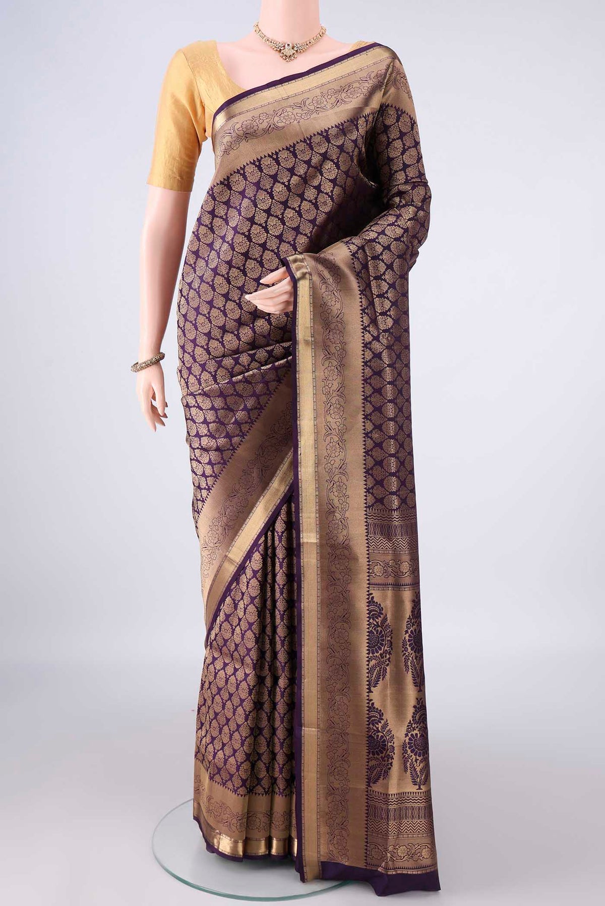 Pure Silk Purple Soft Saree with Zari Brocade on the body and Zari Border.  displayed on a mannequin