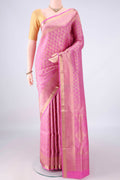 Pure Silk Pink Soft Saree with Zari Brocade on the body and Zari Border.  displayed on a mannequin