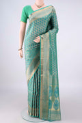 Pure Silk Turquoise Dual Tone Soft Saree with Zari Brocade on the body and Zari Border.  displayed on a mannequin