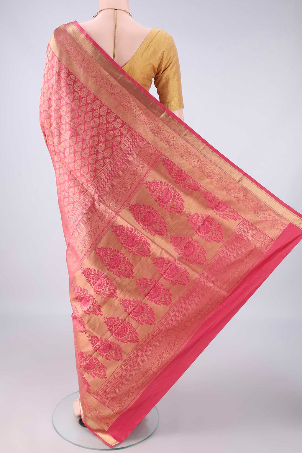 Flat view of Pure Silk Coral Soft Saree with Zari Brocade on the body and Zari Border. 